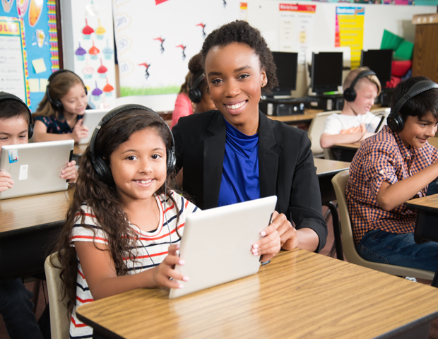 Teacher and students use tablets