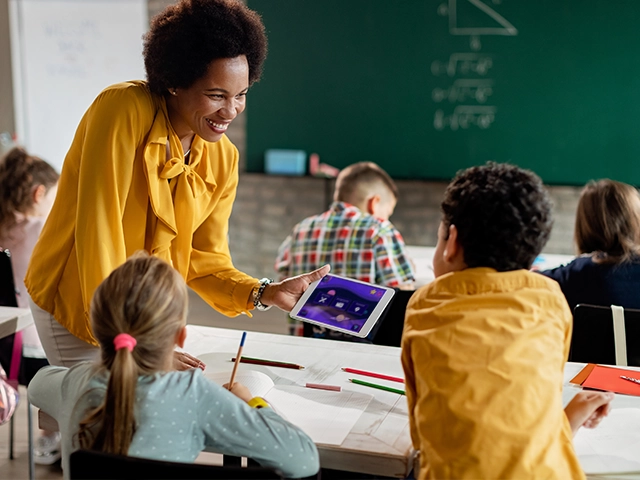 Screenshot of a video about a math teacher teaching in